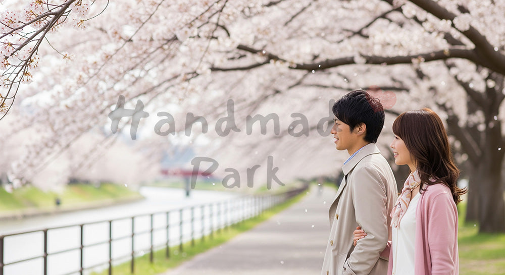 フリー素材 無料 写真|桜並木の下を散歩する日本人カップルの春の花見・お花見デートシーン