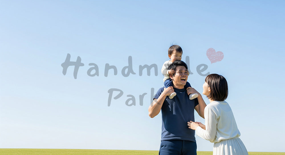 フリー素材 無料 写真|青空が広がる温かな公園のある肩車で空を見上げる日本人親子の後ろ姿