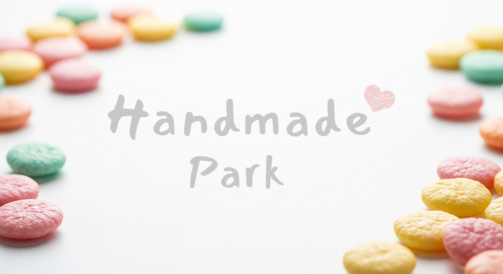 フリー素材 無料 写真|ひなあられパステル背景 中央余白の春素材|テキストを載せやすい余白背景