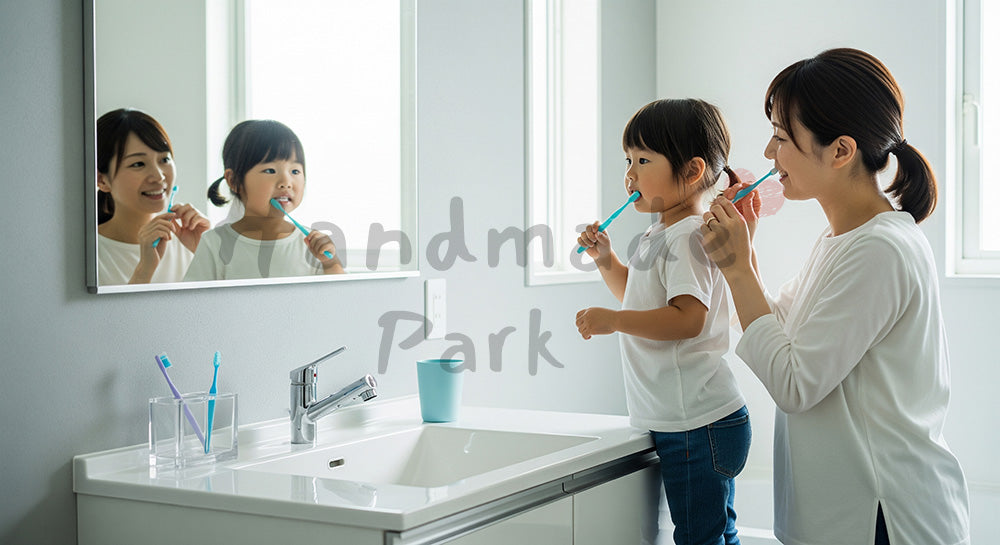 フリー素材 無料 写真｜洗面台の前で幼児の歯みがきをサポートする日本人母親の生活シーン（表現1）