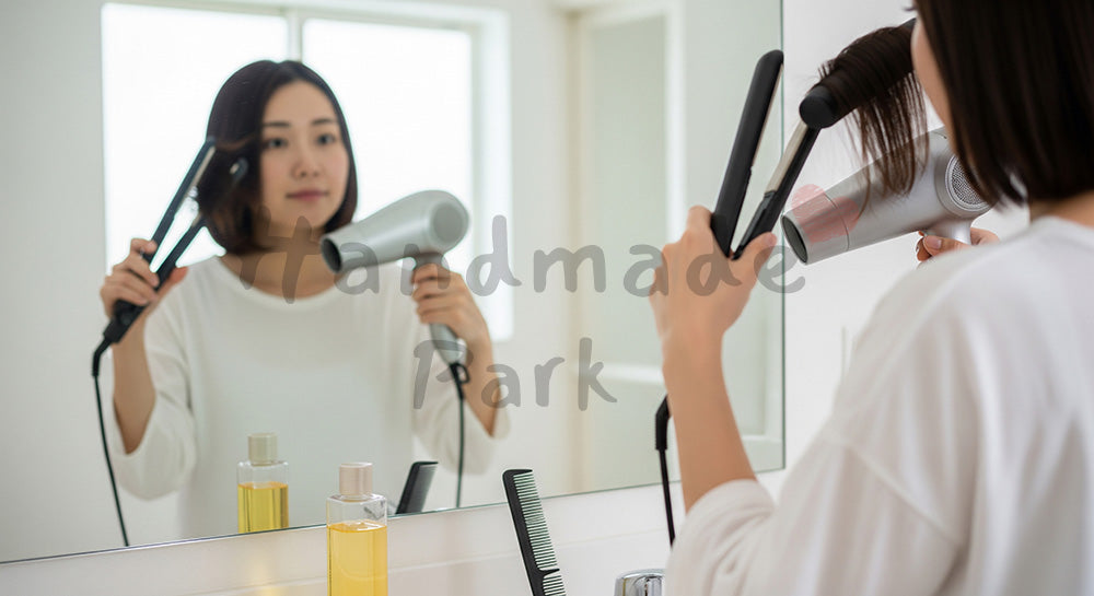 フリー素材 無料 写真｜洗面所でヘアアイロンとドライヤーを使い髪を整える日本人主婦の身支度シーン