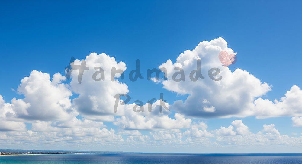 フリー素材 無料 写真｜青空と積雲遠景に海が広がる爽快な風景背景写真