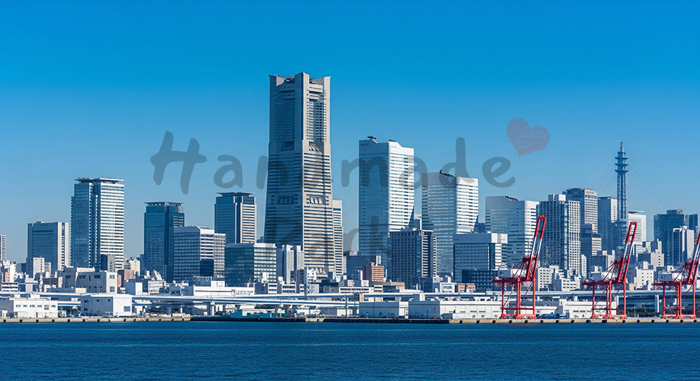 フリー素材 無料 写真｜青空と湾岸の高層ビル群都市と海のスカイライン背景写真