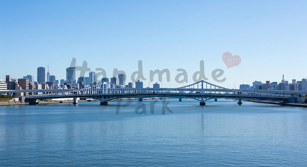 フリー素材 無料 写真｜青空と都市の橋梁と川面都会感のある高解像度背景写真
