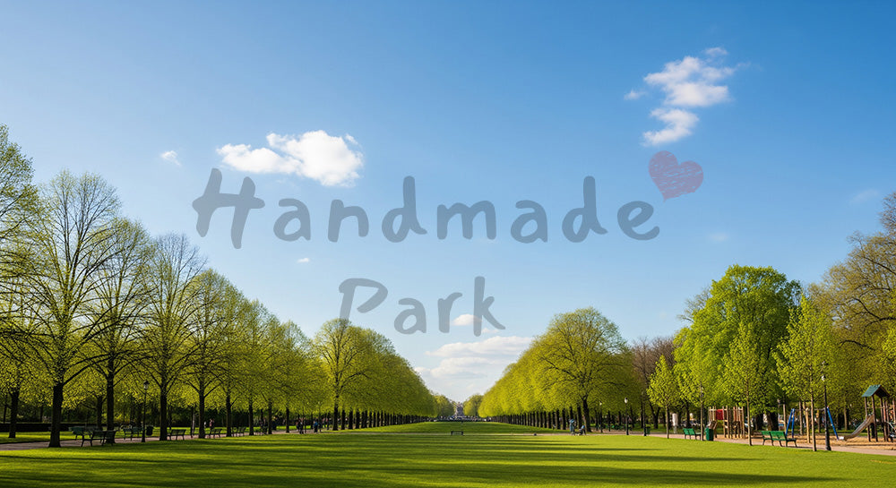 フリー素材 無料 写真｜青空と新緑の芝生公園が爽やかな春のワイド風景、テキストを載せやすい余白設計のデザイン向け背景素材 デザイナー向け