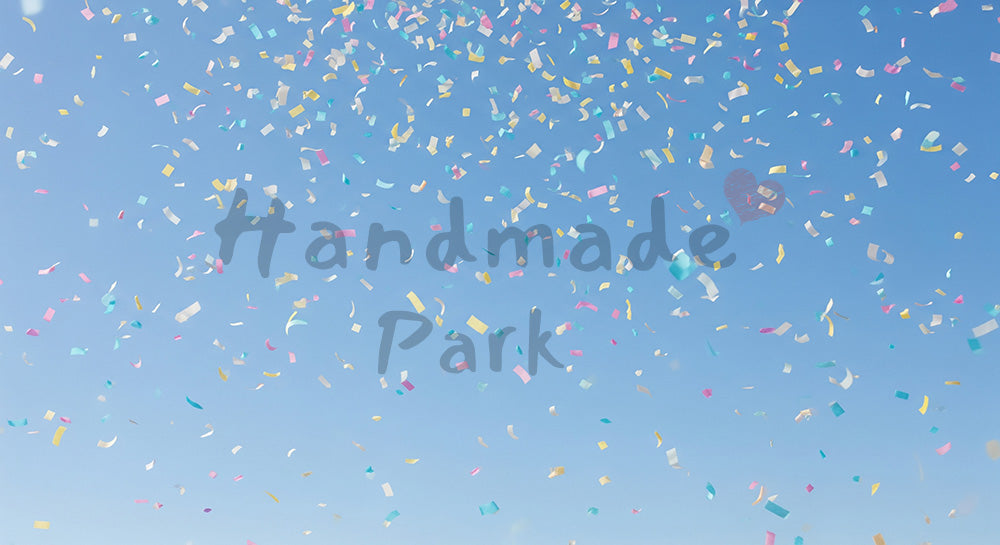 フリー素材 無料 写真｜紙吹雪が舞う青空の祝祭背景、コピー用スペース確保の横長デザイナー素材