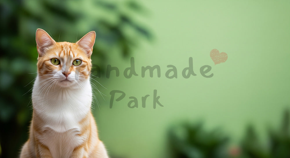 フリー素材 無料 写真｜淡いグリーン背景×猫｜グリーン背景を添えたサムネイル作成に便利