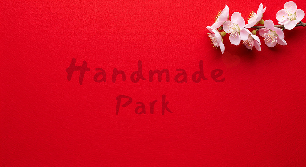 フリー素材 無料 写真｜赤い毛氈テクスチャと桃の花 余白たっぷり｜文字入れしやすい余白あり