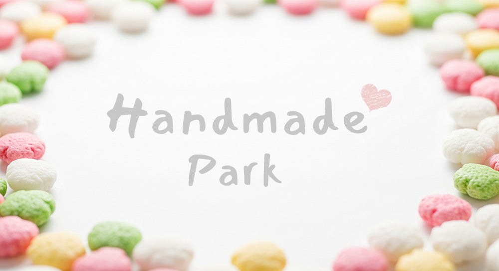 フリー素材 無料 写真|ひなあられパステル背景 中央余白の春素材|余白付きで告知に使いやすい