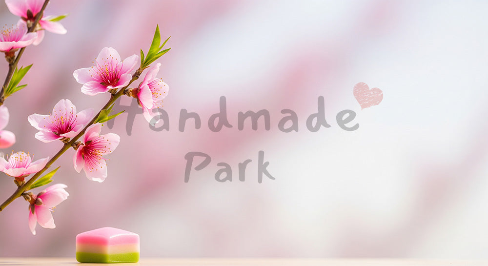 フリー素材 無料 写真｜桃の花と菱餅 右余白で春の告知｜余白たっぷりで見出しが入れやすい