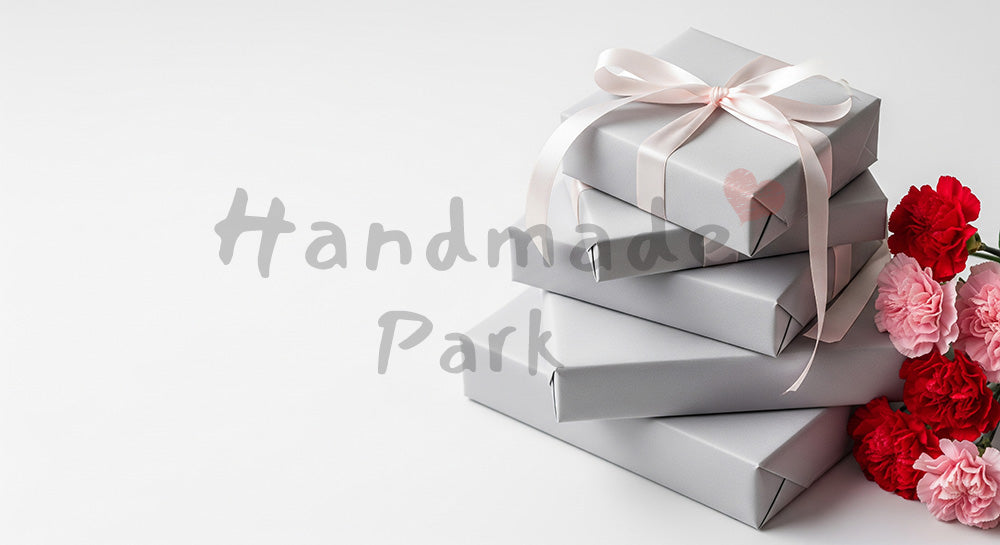 フリー素材 無料 写真｜母の日 シンプル 重ねたギフトボックスとリボン｜コピーを載せやすい構図